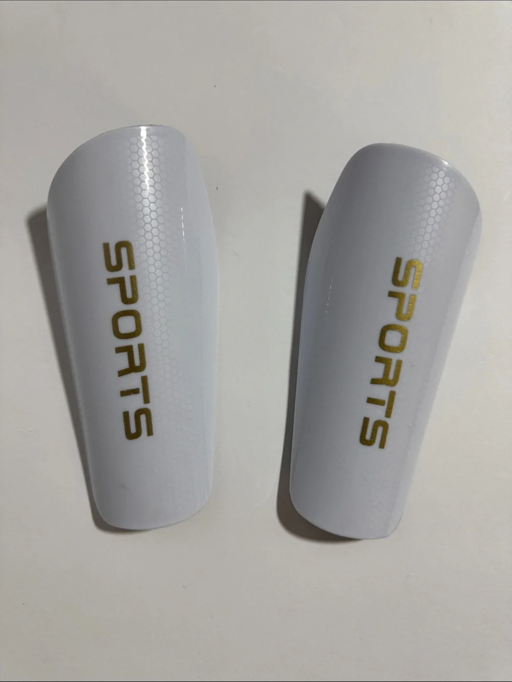 Sports White Kids Soccer Shinguards with Gold SPORTS Logo